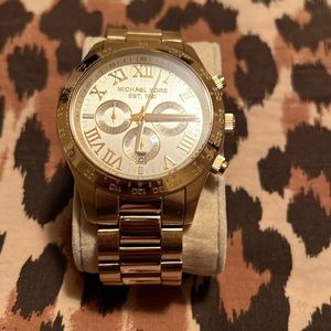 Stainless steel gold Michael Kors watch.
